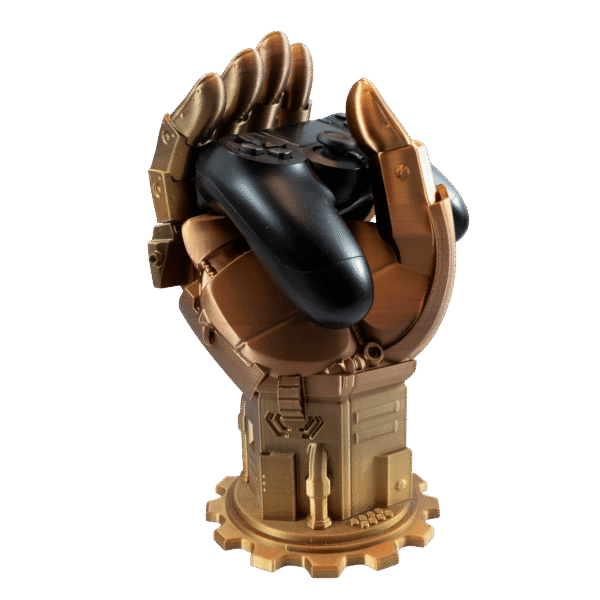 uchwyt na pada z druku 3D (outlet) w formie brązowej, mechanicznej dłoni trzymającej czarny kontroler do konsoli.