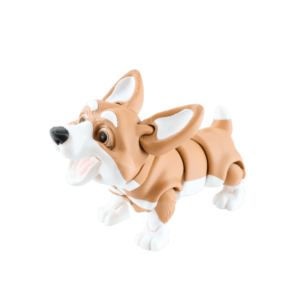 Korgy figurka corgi z druku 3D jasnobrązowa z białymi elementami, otwarty pysk, czarny nos, widoczna struktura warstw