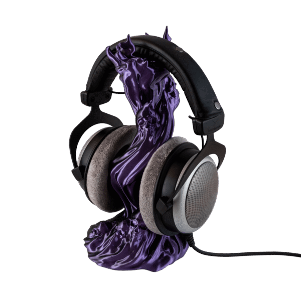 Czachodym stojak na słuchawki z druku 3D w kształcie czaszki, mieniący się fioletowy kolor, praktyczny uchwyt.